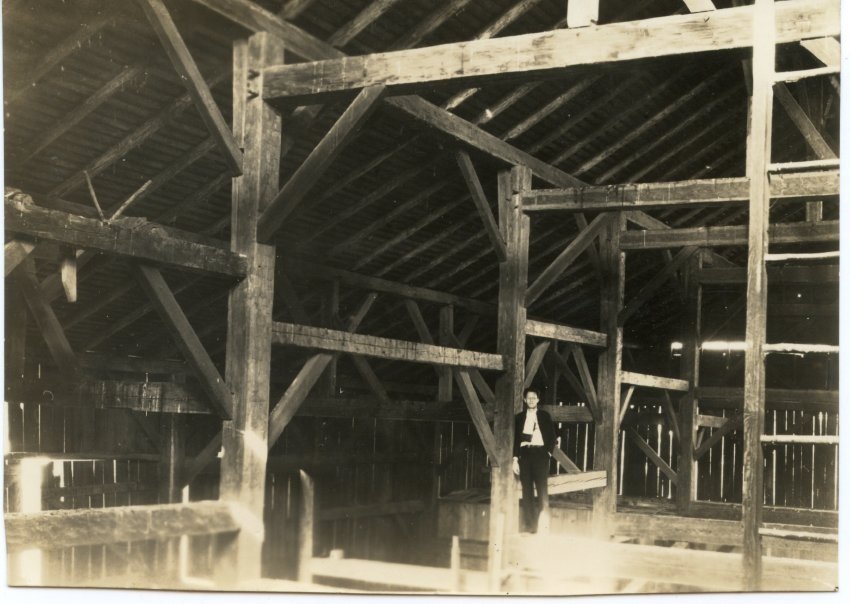 The Borst barn interior is pictured with an unidentified man in 1939.